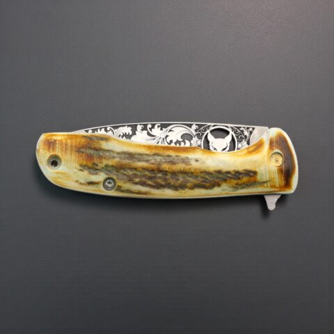 Alternative view of El Yapımı Kurt İşlemeli Çakı Geyik Boynuzu Kabza